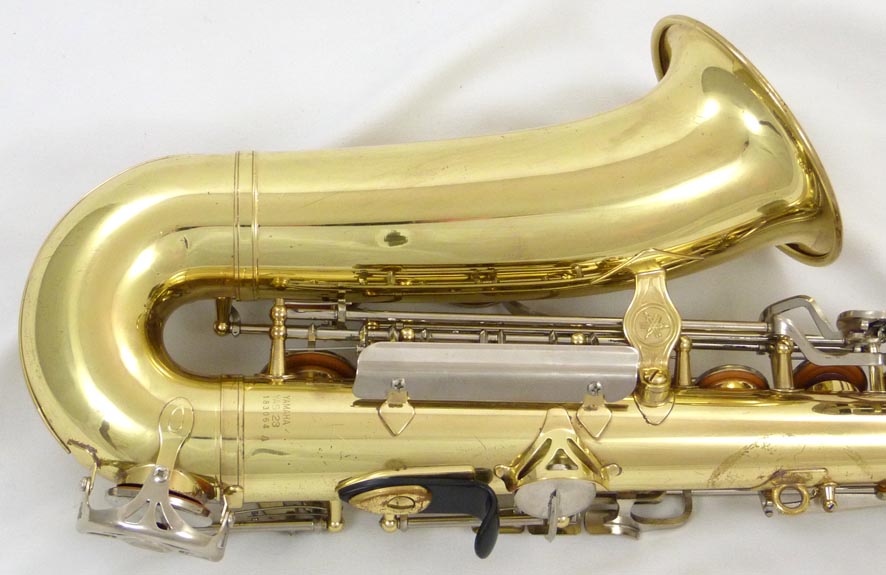 Used Yamaha YAS-23 alto saxophone - close up of lowerside